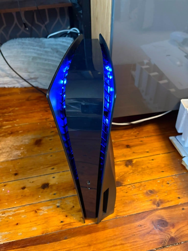 Custom black PlayStation 5 with blue LED lighting