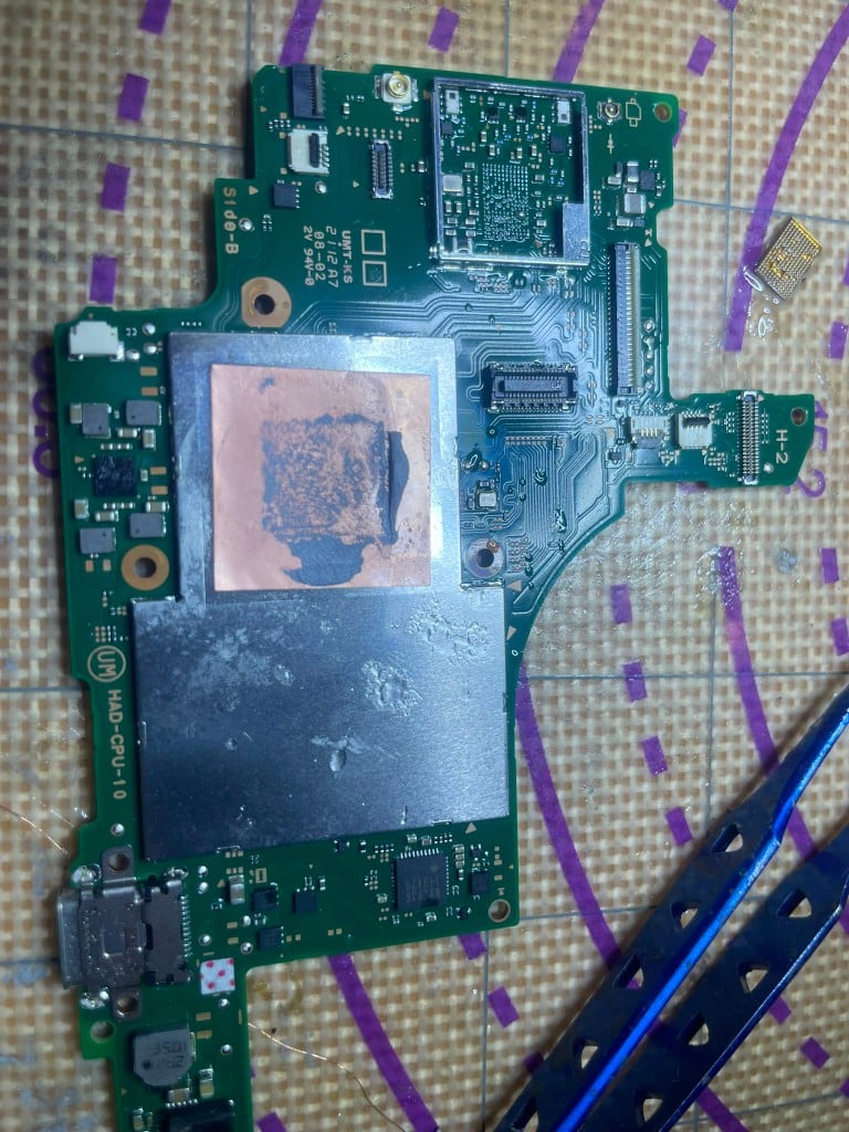 Nintendo Switch HAD-CPU-10 motherboard on the repair mat