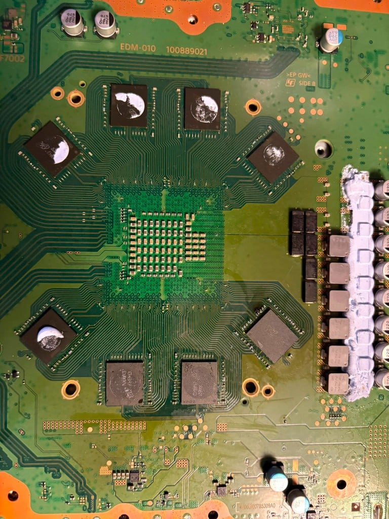 PlayStation 5 EDM-010 motherboard with memory chips visible