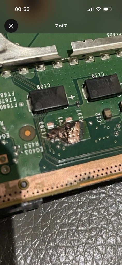 Burn damage on a Nintendo Switch motherboard