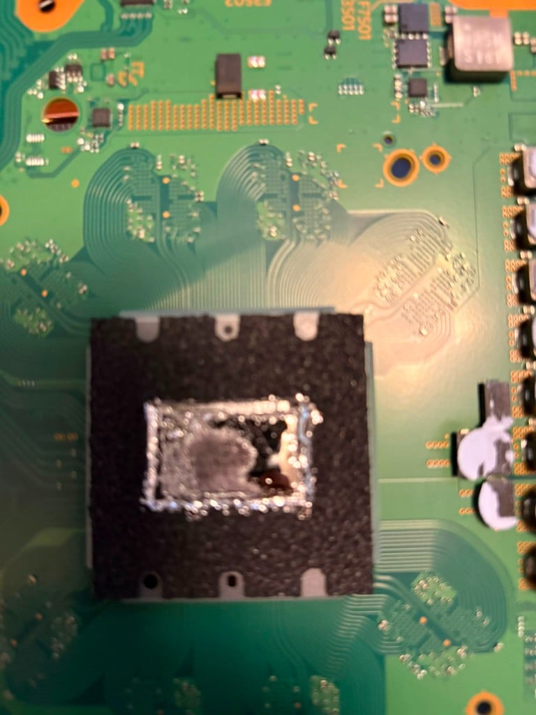 PlayStation 5 APU area with liquid metal under the foam gasket
